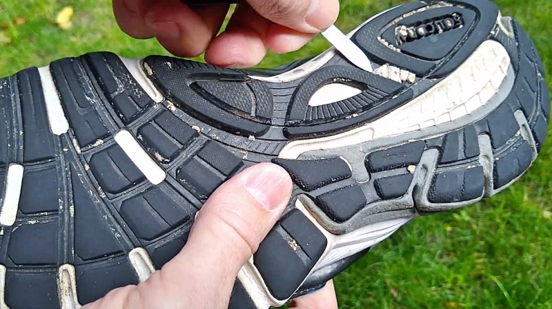 remove excess dirt from shoes