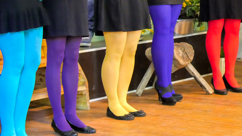 Girls wearing different colored socks